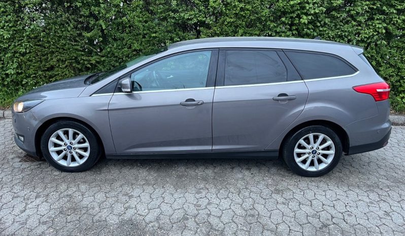 
								Ford Focus 1,0 SCTi 125 Titanium stc. 5d full									
