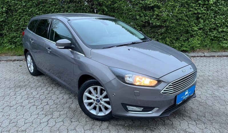 
								Ford Focus 1,0 SCTi 125 Titanium stc. 5d full									