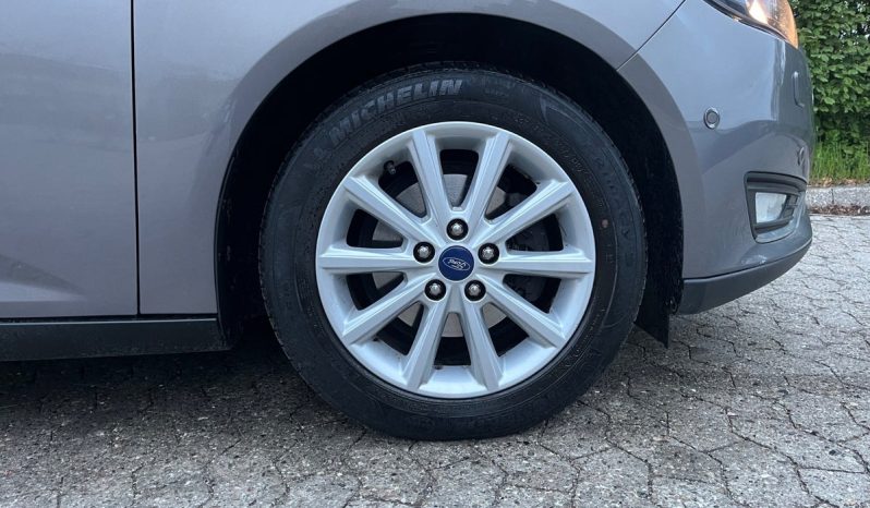 
								Ford Focus 1,0 SCTi 125 Titanium stc. 5d full									