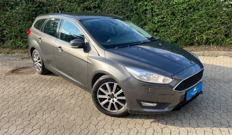 
								Ford Focus 1,0 SCTi 125 Titanium stc. 5d full									